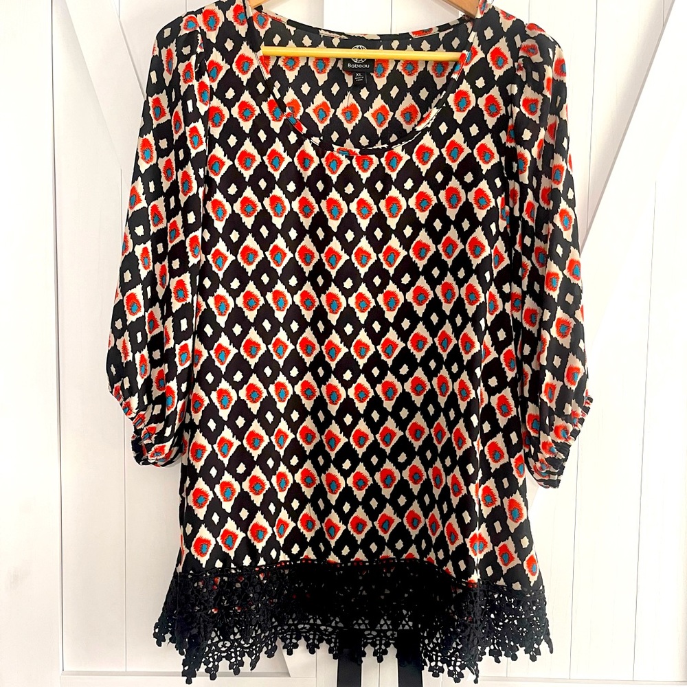 Blouse black print with bottom detailing